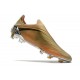Buty piłkarskie adidas X Speedflow+ FG Złoty Czarny
